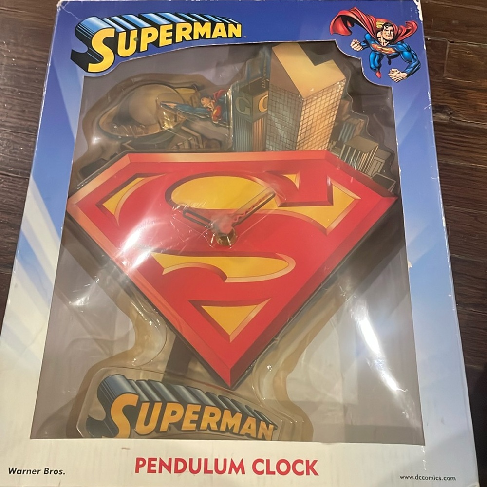 Superman pendulum clock